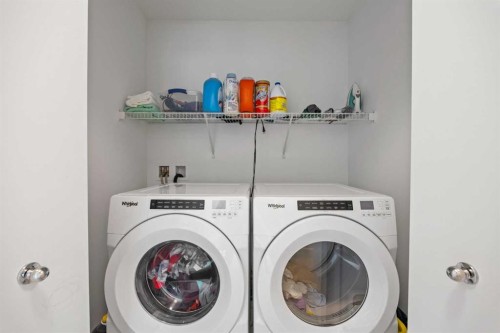 602-335 Creekside Boulevard Sw, Calgary, AB - Indoor Photo Showing Laundry Room