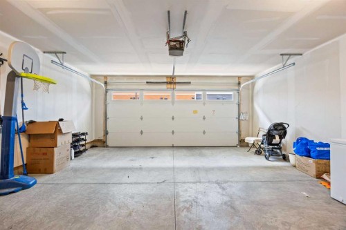 602-335 Creekside Boulevard Sw, Calgary, AB - Indoor Photo Showing Garage
