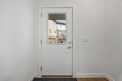 602-335 Creekside Boulevard Sw, Calgary, AB - Indoor Photo Showing Other Room