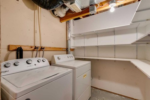 206 Elgin Place Se, Calgary, AB - Indoor Photo Showing Laundry Room