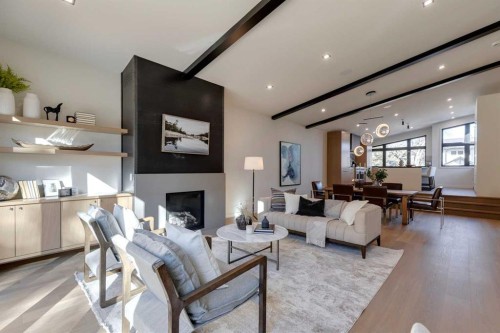 3423 23 Street Nw, Calgary, AB - Indoor Photo Showing Living Room With Fireplace