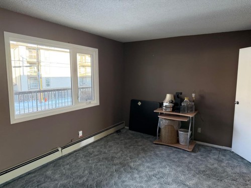 203-234 5 Avenue Ne, Calgary, AB - Indoor Photo Showing Other Room