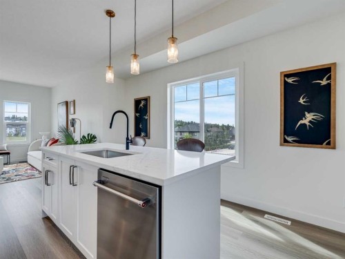 1306-200 Southridge Drive, Okotoks, AB - Indoor Photo Showing Kitchen With Upgraded Kitchen
