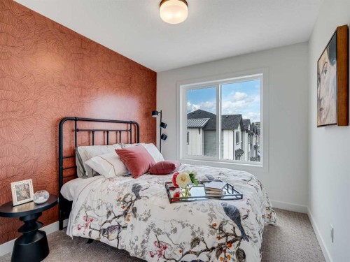 1306-200 Southridge Drive, Okotoks, AB - Indoor Photo Showing Bedroom