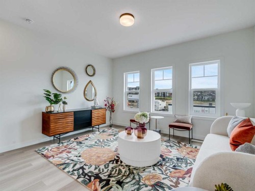 1306-200 Southridge Drive, Okotoks, AB - Indoor Photo Showing Living Room