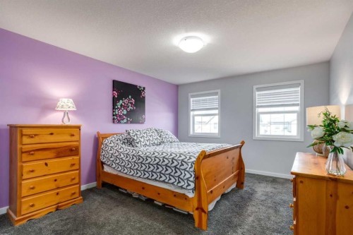 251 Kingsbridge Road Se, Airdrie, AB - Indoor Photo Showing Bedroom