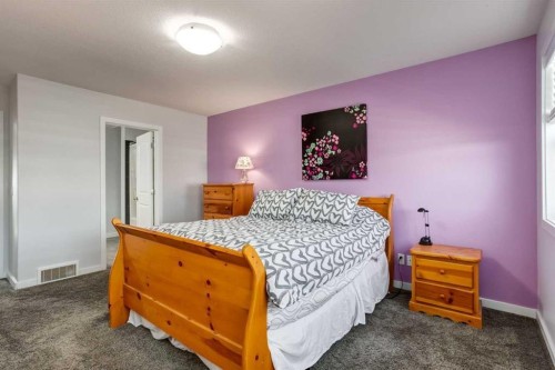 251 Kingsbridge Road Se, Airdrie, AB - Indoor Photo Showing Bedroom
