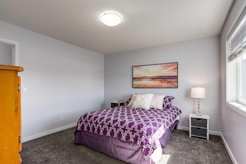 251 Kingsbridge Road Se, Airdrie, AB - Indoor Photo Showing Bedroom