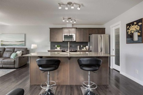 251 Kingsbridge Road Se, Airdrie, AB - Indoor Photo Showing Kitchen With Stainless Steel Kitchen
