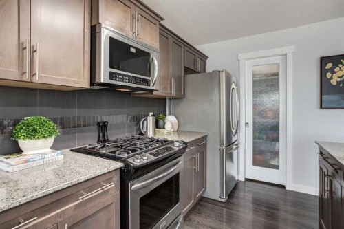 251 Kingsbridge Road Se, Airdrie, AB - Indoor Photo Showing Kitchen With Stainless Steel Kitchen With Upgraded Kitchen