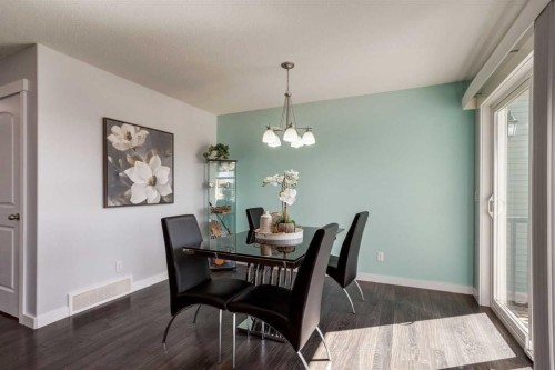 251 Kingsbridge Road Se, Airdrie, AB - Indoor Photo Showing Dining Room