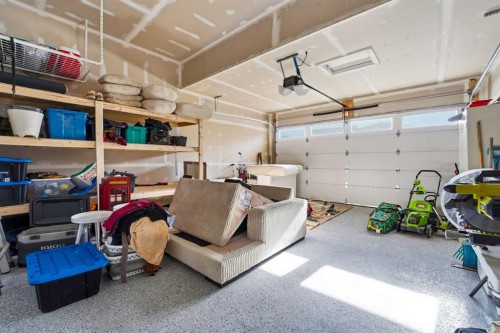 16 Key Cove Sw, Airdrie, AB - Indoor Photo Showing Garage