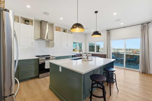 16 Key Cove Sw, Airdrie, AB - Indoor Photo Showing Kitchen With Upgraded Kitchen
