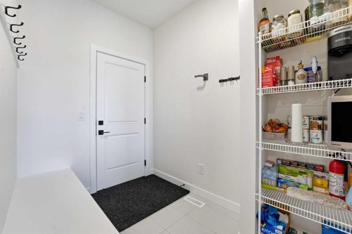 16 Key Cove Sw, Airdrie, AB - Indoor Photo Showing Other Room