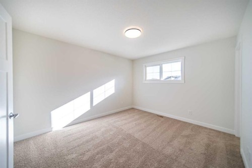 19 Herron Walk Ne, Calgary, AB - Indoor Photo Showing Other Room
