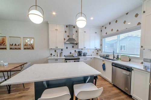 643 Cornerstone Drive Ne, Calgary, AB - Indoor Photo Showing Kitchen With Double Sink