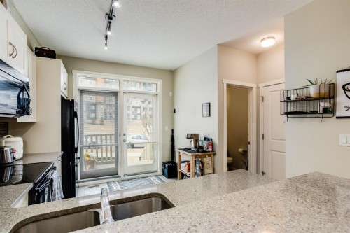 29 Kinlea Common Nw, Calgary, AB - Indoor Photo Showing Kitchen With Double Sink