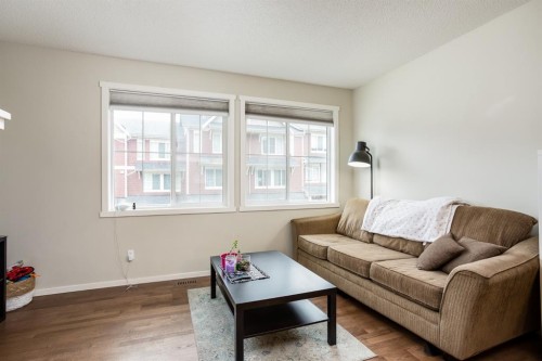 29 Kinlea Common Nw, Calgary, AB - Indoor Photo Showing Living Room