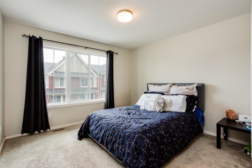 29 Kinlea Common Nw, Calgary, AB - Indoor Photo Showing Bedroom