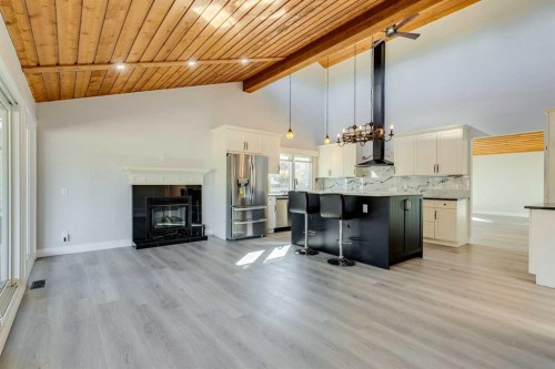 3020 Palliser Drive Sw, Calgary, AB - Indoor With Fireplace