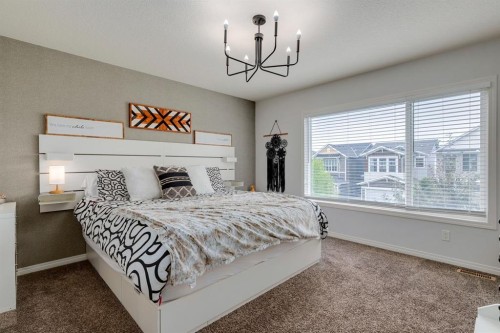 53 Seton Manor Se, Calgary, AB - Indoor Photo Showing Bedroom