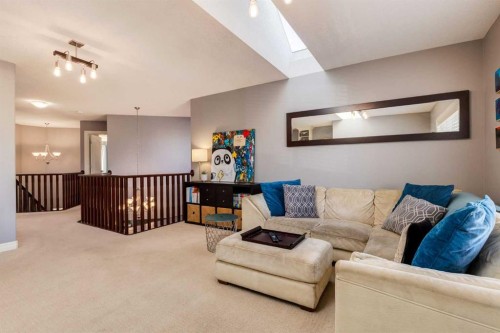 27 Tuscany Estates Drive Nw, Calgary, AB - Indoor Photo Showing Living Room