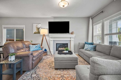 412 Evanston Way Nw, Calgary, AB - Indoor Photo Showing Living Room With Fireplace