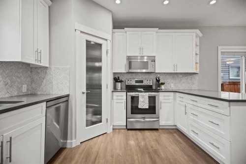 412 Evanston Way Nw, Calgary, AB - Indoor Photo Showing Kitchen With Stainless Steel Kitchen With Upgraded Kitchen