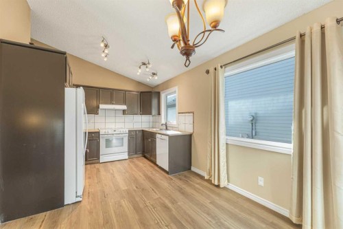 215 Hidden Vale Place Nw, Calgary, AB - Indoor Photo Showing Kitchen