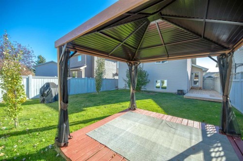 215 Hidden Vale Place Nw, Calgary, AB - Outdoor With Deck Patio Veranda With Exterior