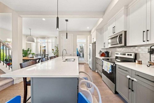 281 Waterford Boulevard, Chestermere, AB - Indoor Photo Showing Kitchen With Double Sink With Upgraded Kitchen