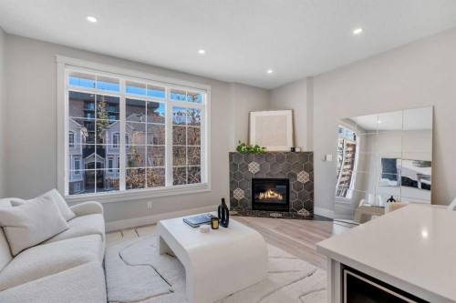 1227 12 Street Sw, Calgary, AB - Indoor Photo Showing Living Room With Fireplace