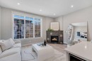 1227 12 Street Sw, Calgary, AB  - Indoor Photo Showing Living Room With Fireplace 