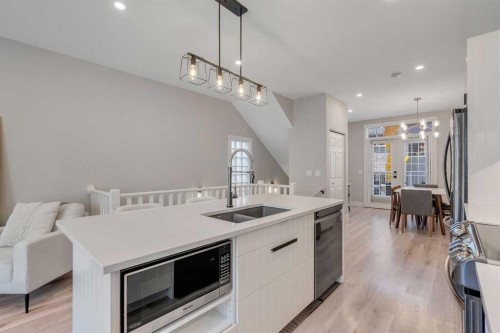 1227 12 Street Sw, Calgary, AB - Indoor Photo Showing Kitchen With Double Sink