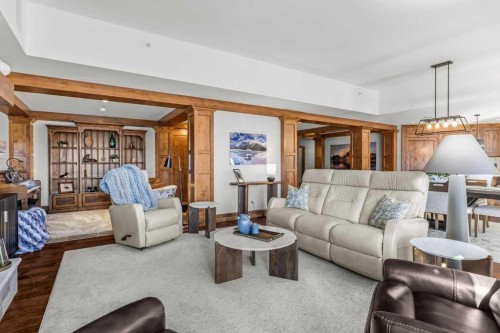 303-150 Stonecreek Road, Canmore, AB - Indoor Photo Showing Living Room