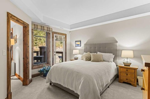 303-150 Stonecreek Road, Canmore, AB - Indoor Photo Showing Bedroom