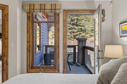 303-150 Stonecreek Road, Canmore, AB - Indoor Photo Showing Bedroom