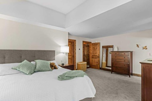 303-150 Stonecreek Road, Canmore, AB - Indoor Photo Showing Bedroom