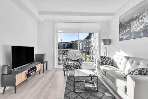 305-30 Sage Hill Walk Nw, Calgary, AB - Indoor Photo Showing Living Room