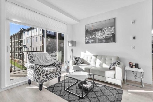 305-30 Sage Hill Walk Nw, Calgary, AB - Indoor Photo Showing Living Room