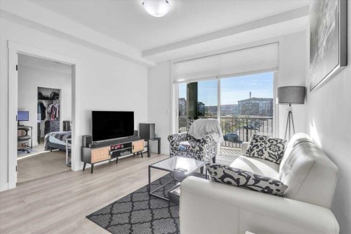 305-30 Sage Hill Walk Nw, Calgary, AB - Indoor Photo Showing Living Room