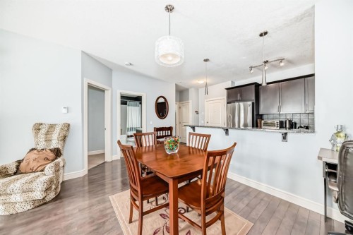 3104-15 Sunset Square, Cochrane, AB - Indoor Photo Showing Dining Room