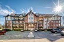 3104-15 Sunset Square, Cochrane, AB  - Outdoor With Facade 