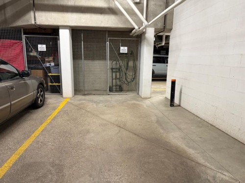 3104-15 Sunset Square, Cochrane, AB - Indoor Photo Showing Garage