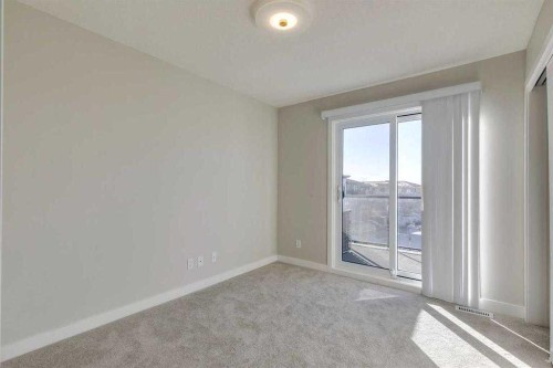 207-14800 1 Street, Calgary, AB - Indoor Photo Showing Other Room