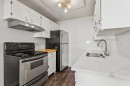 4-195 Manora Place Ne, Calgary, AB  - Indoor Photo Showing Kitchen With Double Sink 