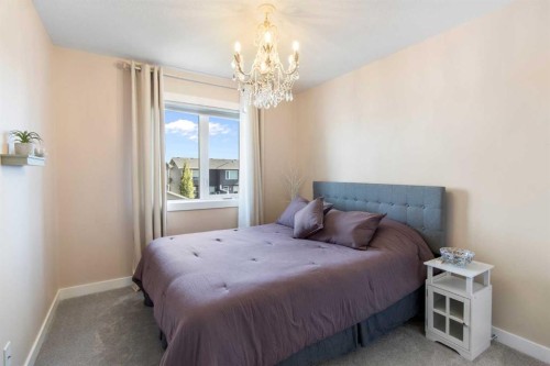 112 Fireside Crescent, Cochrane, AB - Indoor Photo Showing Bedroom