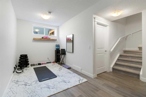 112 Fireside Crescent, Cochrane, AB - Indoor Photo Showing Other Room