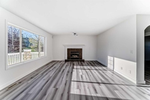 289 Canals Circle Sw, Airdrie, AB - Indoor Photo Showing Living Room With Fireplace