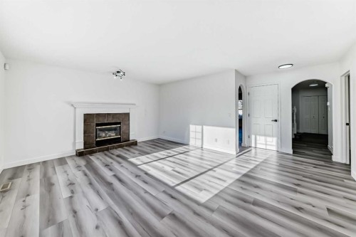 289 Canals Circle Sw, Airdrie, AB - Indoor Photo Showing Living Room With Fireplace